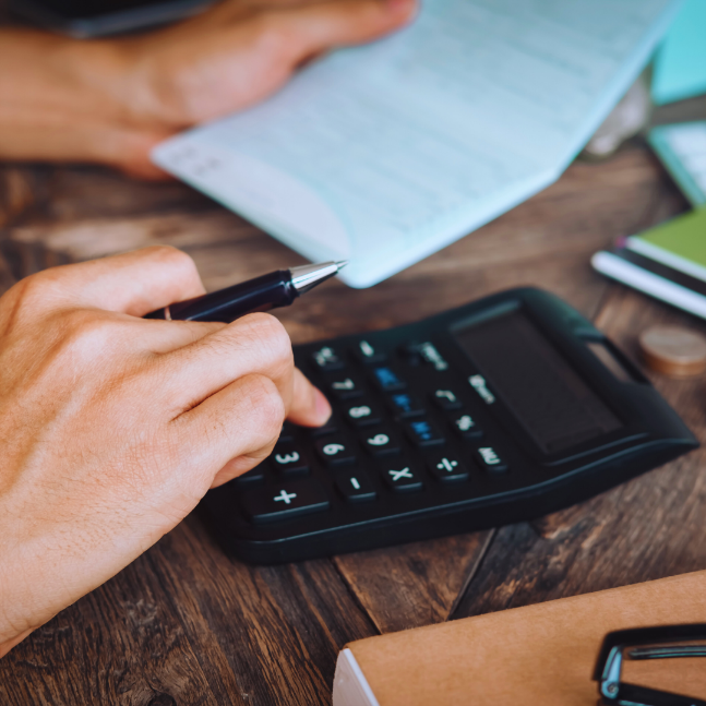 person using a calculator